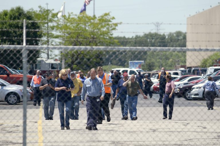Employees evacuate the GM Marion Metal Center in Marion, Ind., following a chemical explosion Tuesday, July 1, 2014. One worker died and five more were taken to Marion General Hospital with non-life threatening injuries. (AP Photo/Chronicle-Tribune, Jeff Morehead)