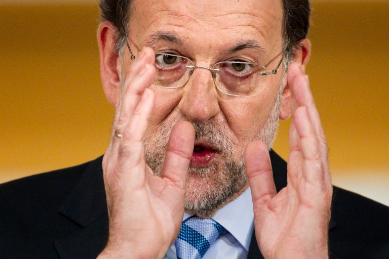   Spain's Prime Minister Mariano Rajoy speaks during a press conference at the Moncloa Palace, in Madrid, Sunday, June 10, 2012. Spain became the fourth and largest country to ask Europe to rescue its failing banks, a bailout of up to 100 billion euros ($125 billion) that leaders hoped would stabilize a financial crisis that threatens to break apart the 17-country eurozone. (AP Photo/Daniel Ochoa de Olza)  