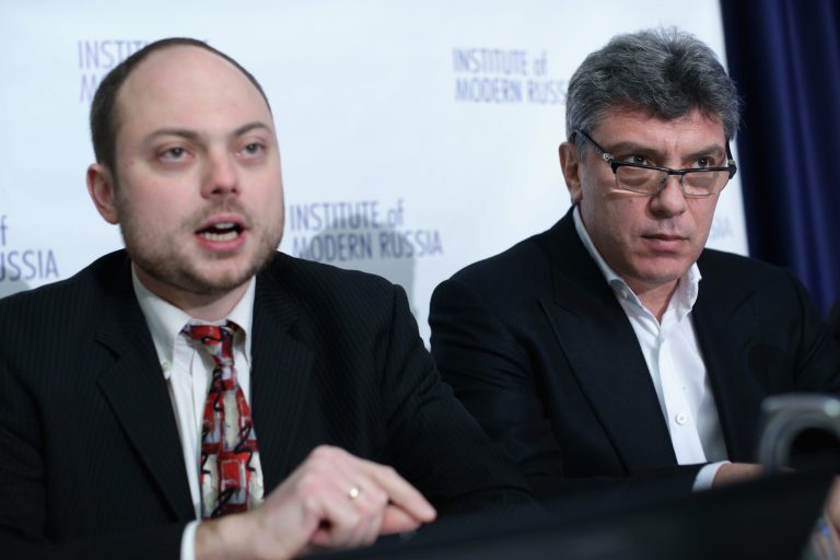 Vladimir Kara-Murza, left, speaks as Russian opposition leader and former Deputy Prime Minister Boris Nemtsov listens during a news conference on January 30, 2014. (Photo by Alex Wong/Getty Images)