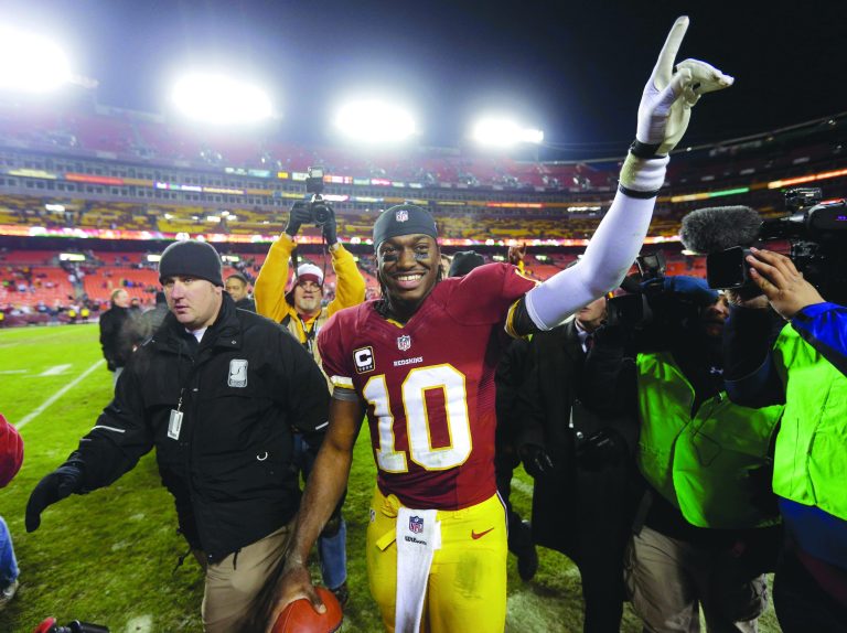 Rob Carr/Getty Images
Robert Griffin III didn't throw any interceptions in the Redskins' victory over the Cowboys on Sunday and finished with just five all season.