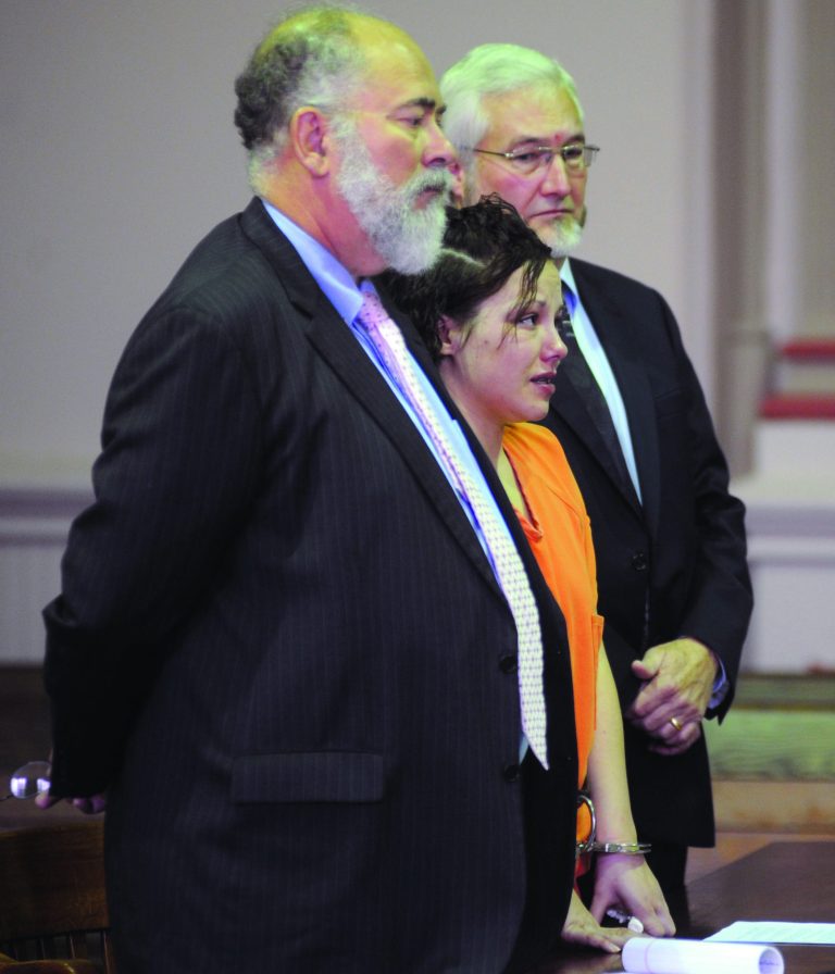 Katrina Culberson listens to court proceedings on Wednesday, Sept. 26, 2012 in Zanesville, Ohio. She stands between her attorneys Jerry McHenry and Greg Myers, right. Culberson, of Canton, Ohio, is accused of the murder of Celeste Fronsman, 29, also of Canton. On Aug. 26, a driver found Fronsman on a road northeast of Zanesville in eastern Ohio. She had been raped and burned and had a strap around her neck. She died two days later at a Columbus hospital. Culberson entered guilty pleas in Muskingum County Common Pleas court to one count of aggravated murder, one count of aggravated arson and one count of kidnapping. She has agreed testify against two others charged in the killing. (AP Photo/ Zanesville Times Recorder, Trevor Jones) NO SALES