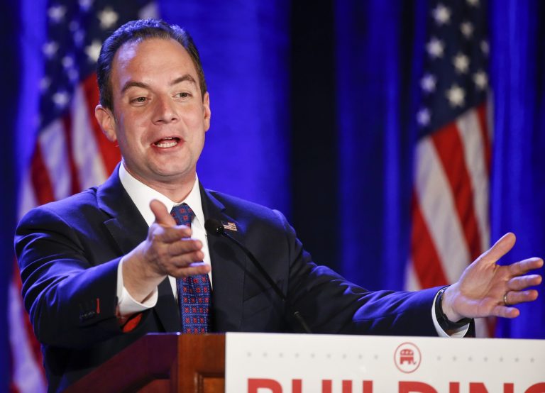 Reince Priebus, Chairman of the Republican Party, introduces Dr. Ben Watson as the luncheon speaker at the Republican National Committee meetings Thursday, Jan. 15, 2015, in San Diego. (AP Photo/Lenny Ignelzi)