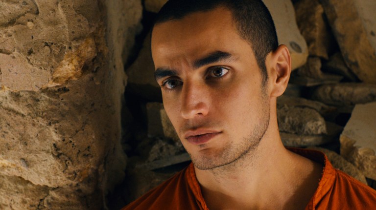 This film image released by Adopt Films shows Adam Bakri in a scene from the film 