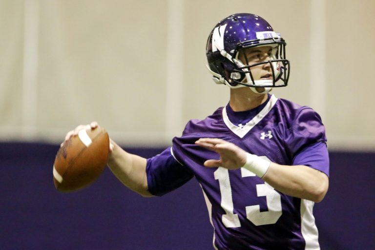 Northwestern quarterback Trevor Siemian throws as the football team participates in an NCAA college spring football practice on April 1 in Evanston, Ill. (AP Photo/M. Spencer Green)