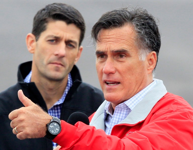 Republican presidential candidate former Massachusetts Gov, Mitt Romney speaks during a campaign rally with his running mate Rep. Paul Ryan, R-Wis., left, Tuesday, Sept. 25, 2012, at Wright Brothers Aviation in Vandalia, Ohio. (AP Photo/Al Behrman)