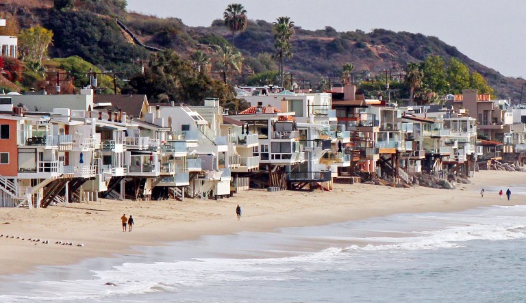 People's opinions are highly correlated with partisan loyalty, but few feel particularly strongly about it. (AP Photo/John Antczak)