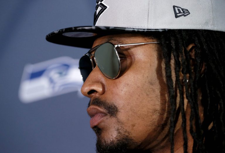Seattle Seahawks' Marshawn Lynch attends a news conference for NFL Super Bowl XLIX football game, Wednesday, Jan. 28, 2015, in Phoenix. (AP Photo/Matt York)