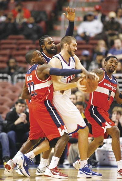 H. Rumph Jr./AP
The Wizards'defense held the 76ers to 41.7 percent shooting from the field but lost in their preseason finale Tuesday night.