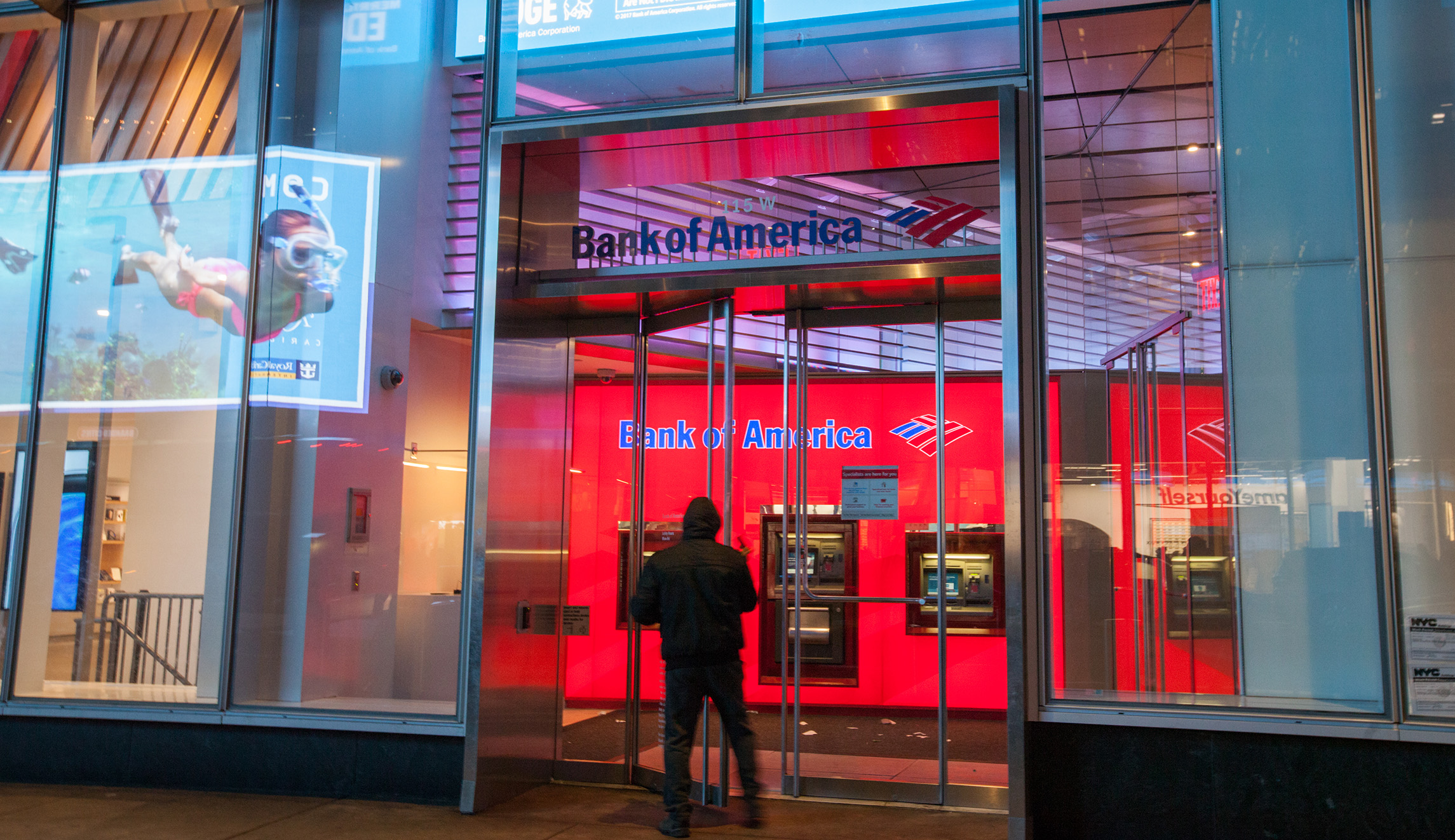 With $2.9 billion charge, Bank of America joins lenders pinched by tax bill
