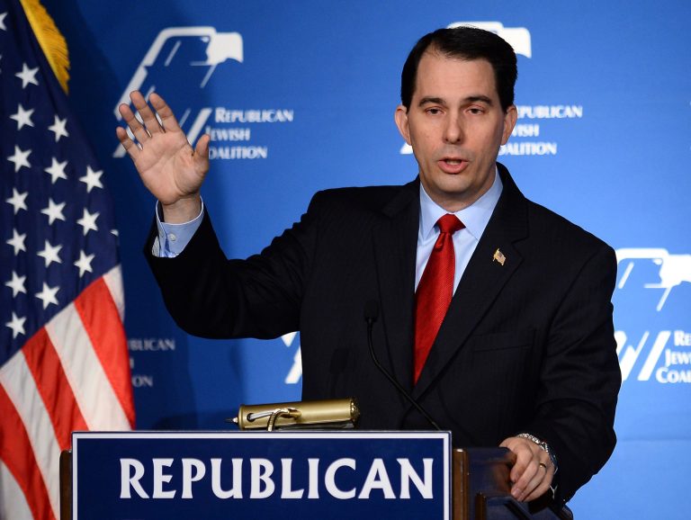 Wisconsin Gov. Scott Walker's now-famous union bargaining reforms of 2011 have incurred the wrath of America's big labor unions, which are now eager to defeat him. (Photo by Ethan Miller/Getty images)