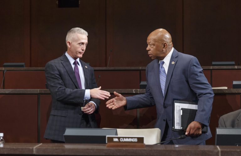 Rep. Trey Gowdy, R-S.C., chairman of the House Select Committee on Benghazi, and Rep. Elijah Cummings, D-Md., right, the ranking member, arrive as the panel holds its first public hearing to investigate the 2012 attacks on the U.S. consulate in Benghazi, Libya, where a violent mob killed four Americans, including Ambassador Christopher Stevens, on Capitol Hill in Washington, Wednesday, Sept. 17, 2014. (AP Photo/J. Scott Applewhite)