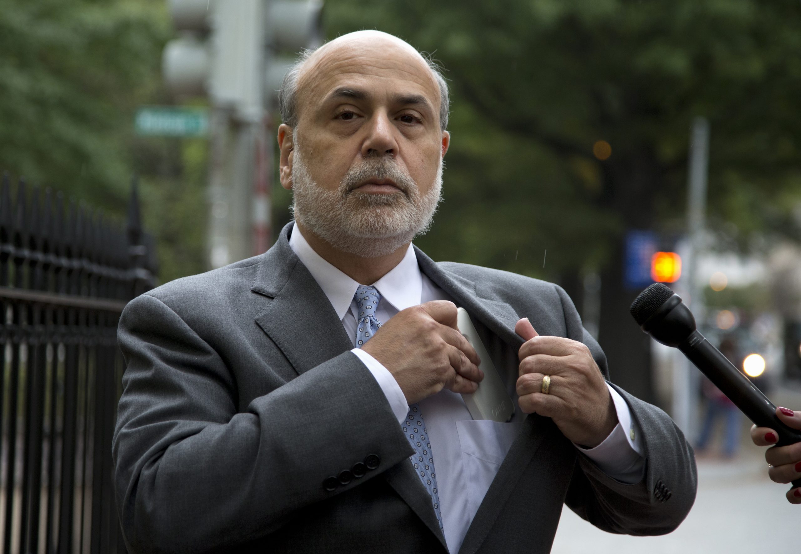 Bernanke says he was reluctant on AIG bailout