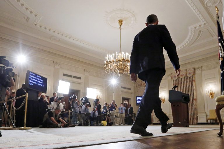 President Obama approaches the podium to speak about the situation in Iraq in the State Dining Room at the White House in Washington, Thursday. (AP/Charles Dharapak)