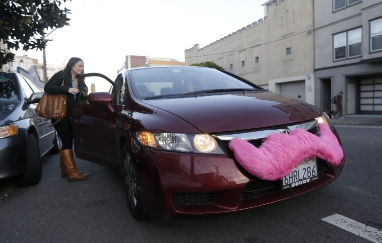 While Uber is shaking up the taxi industry, government regulators are really upset with the tech company. (AP/Jeff Chiu)