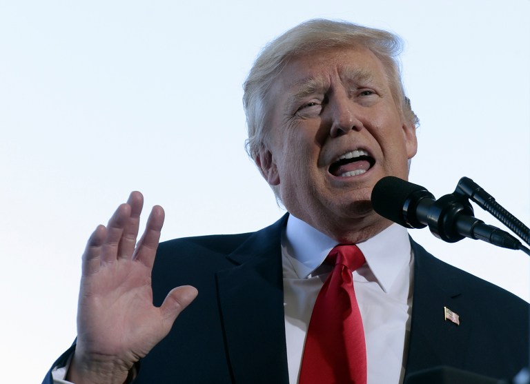 Theories have proliferated since Tuesday night when reporter David Cay Johnston unveiled part of President Trump's 2005 tax return. (AP Photo/Susan Walsh)