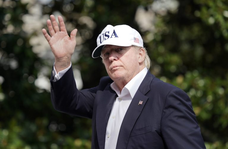 President Donald Trump waves as he walks across the South Lawn of the White House in Washington, Sunday, Aug. 27, 2017, following his return after spending the weekend at nearby Camp David, Md. (AP Photo/Pablo Martinez Monsivais)