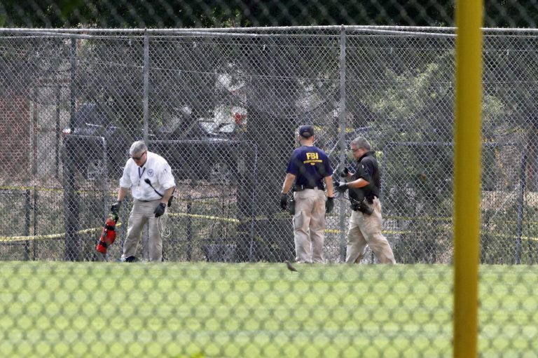 This is the roster for the Democratic Party's congressional baseball team. (AP Photo/Jacquelyn Martin)