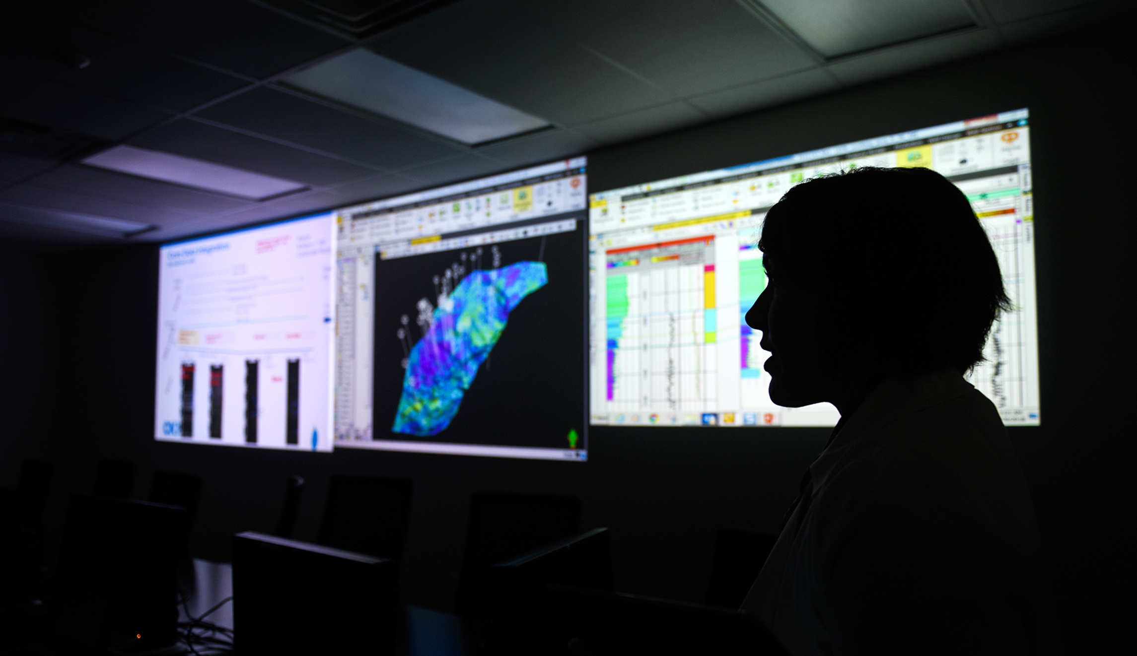 Vice President of Engineering and Development of CNX Resources Corporation Andrea Passman stands in a control room that is used for predicting drilling locations at CNX's headquarters on July 30 in Cannonsburg, Pa.