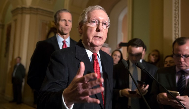 Senate Majority Leader Mitch McConnell, R-Ky., joined at rear by Sen. John Thune, R-S.D., tells reporters that he has spoken to President Donald Trump and other leaders about the Alabama Senate race and the allegations of sexual misconduct against GOP candidate Roy Moore, on Capitol Hill in Washington, Tuesday, Nov. 14, 2017. McConnell and other Republicans have called for Moore to step aside. (AP Photo/J. Scott Applewhite)