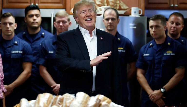 President Donald Trump speaks to members of the U.S. Coast Guard at the Lake Worth Inlet Station, on Thanksgiving, Thursday, Nov. 23, 2017, in Riviera Beach, Fla. (AP Photo/Alex Brandon)