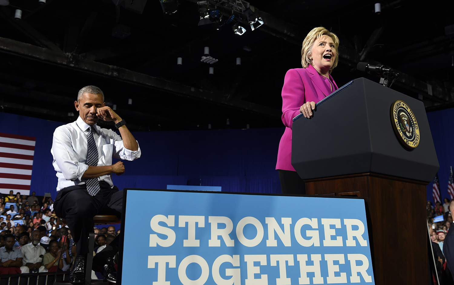 Clinton pledges to continue Obama’s work