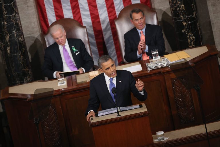 Flanked by U.S. Vice President Joe Biden (L) and Speaker of the House John Boehner (R), President Obama delivers his State of the Union speech before a joint session of Congress at the U.S. Capitol Feb. 12, 2013 in Washington, DC.. (Photo by Mark Wilson/Getty images)