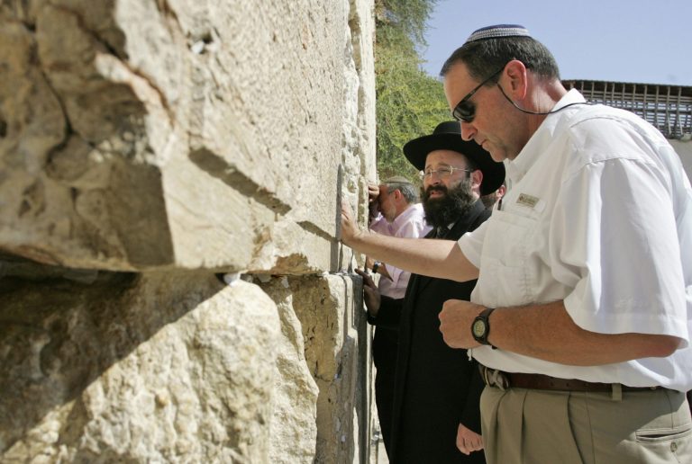 Former Arkansas Gov. Mike Huckabee is seen at the Western Wall, Judaism's holiest site, during his visit to Jerusalem, Monday, Aug. 18, 2008. (AP Photo/Sebastian Scheiner)
