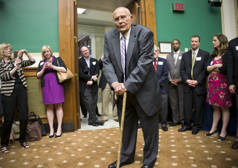 Rep. John Dingell, D-Mich., is celebrated by friends and colleagues as he becomes the longest-serving member of Congress in history with his 20,997th day as a representative on June 7. Dingell announced Monday that he will not seek another term in office. (AP Photo/J. Scott Applewhite)