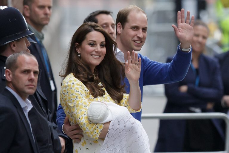 Britain's Prince William and Kate, Duchess of Cambridge and their newborn baby princess, wave to the public as they leave St. Mary's Hospital's exclusive Lindo Wing in London, Saturday, May 2, 2015. (AP Photo/Tim Ireland)