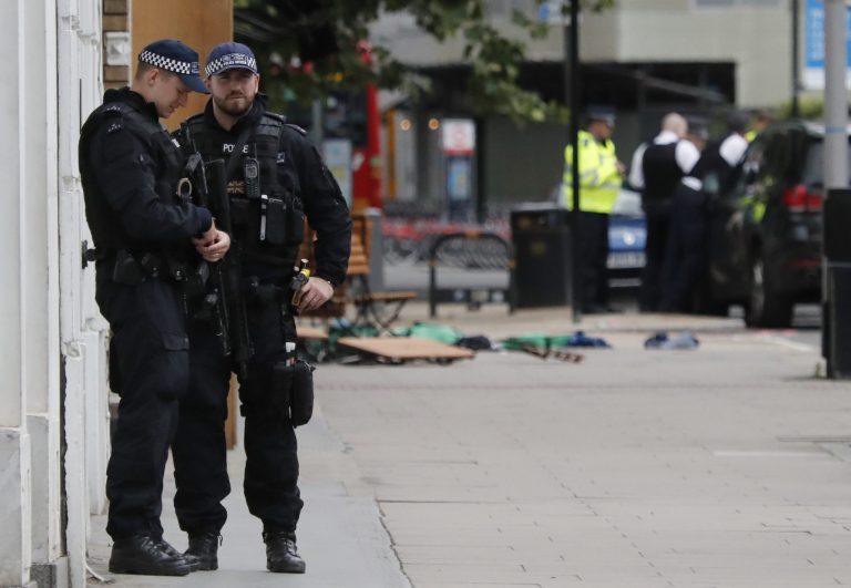 Police patrol on the streets in the London Bridge area of London on June 4. Police have identified an apartment rented by one of the attackers where they may have planned the attacks. (AP Photo/Frank Augstein)
