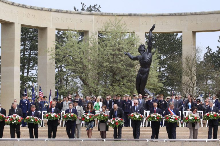 Officials lay wreathes at the Memorial of the Colleville American military cemetery, during a ceremony in Colleville sur Mer, western France, Thursday June 6, 2013, on the 69th anniversary of D-Day. (AP File)