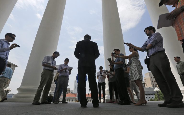 Congressional Republican candidate David Brat, center, speaks during a press conference at the Capitol in Richmond, Va., Wednesday, May 28. (AP/Steve Helber)