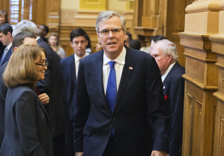 Former Florida Gov. Jeb Bush visits with lawmakers after speaking in the Georgia Senate, Thursday, March 19, 2015, in Atlanta. (AP Photo/David Goldman)
