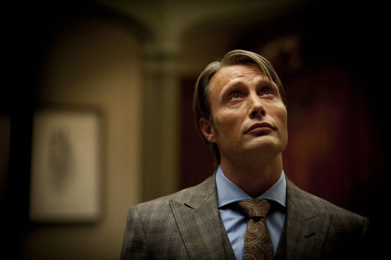 This publicity image released by NBC shows Mads Mikkelsen as Dr. Hannibal Lecter in a scene from the TV series, 