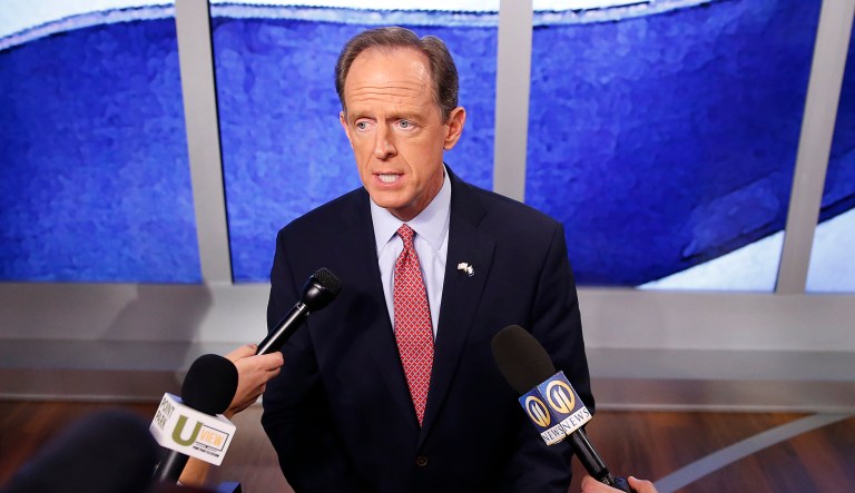 Sen. Pat Toomey, R-Pa., a member of the Finance Committee, told reporters Thursday he was confident the an agreement would be reached between the House and Senate on tax reform. (AP Photo/Jared Wickerham)