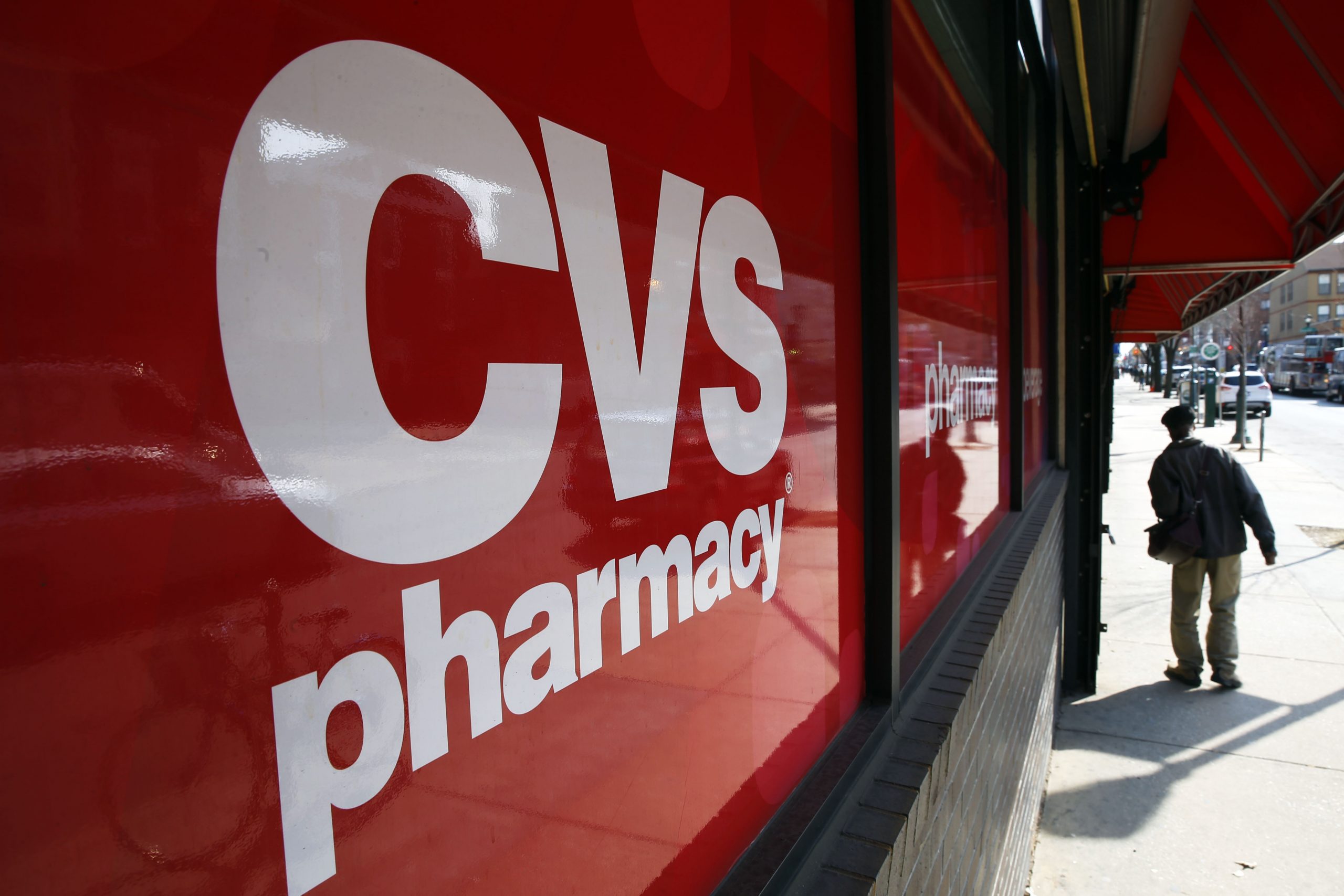 CVS 2Q profit climbs 11 percent, forecast rises