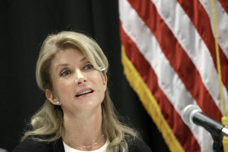 Wendy Davis, the Democratic candidate for governor of Texas, quickly responded to a video of her supporters mocking her Republican opponent Attorney General Greg Abbott for his disability. (AP/LM Otero)