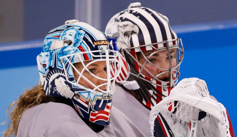 Team USA hockey goalies Alex Rigsby and Nicole Hensley may be required by the International Olympic Committee to alter the images on their masks, which depict the State of Liberty. (AP Photo/Jae C. Hong)