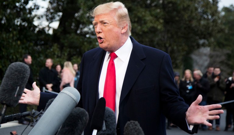 President Trump speaks to reporters before leaving the White House. (AP Photo/Manuel Balce Ceneta)
