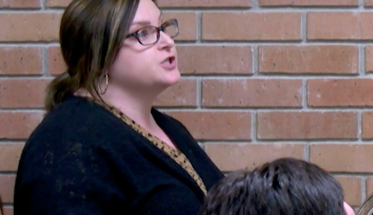 In this Monday, Jan. 8, 2018, image made from a video provided by KATC-TV middle-school English teacher Deyshia Hargrave speaks during a Vermilion Parish School Board meeting in Abbeville, La., west of New Orleans. Hargrave was removed from the school board meeting, forcibly handcuffed, and jailed after questioning pay policies during a public comment period. (KATC-TV via AP)