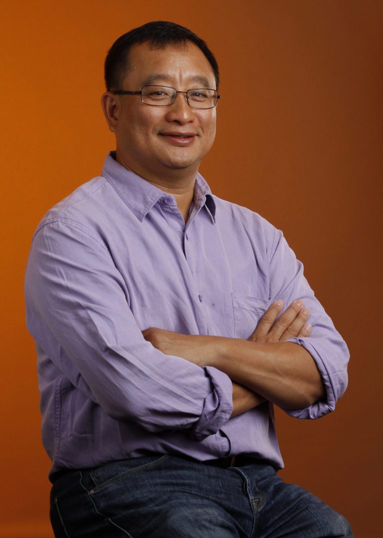 In this 2013 photo provided by Alibaba, Jingming Li, president and chief architect of Alipay, poses for photos in Santa Clara, Calif. Alipay, the payments unit recently spun off from Chinese e-commerce powerhouse Alibaba, is launching a service for U.S. retailers called ePass. Alipay has already been working in beta mode with retailers such as luxury deal site Gilt.com, The Gap and H&M. (AP Photo/Alibaba, Paul Sakuma)