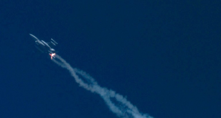 In this March, 2017, photo supplied by Sandia National Laboratories, an F-16C from Nellis Air Force Base in Nevada releases a mock nuclear weapon for a test at Tonopah Test Range near Tonopah, Nev. (James Galli/Sandia National Laboratories via AP)