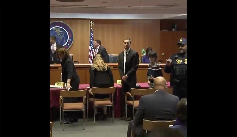 FCC Chairman Ajit Pai was in the middle of delivering his statement on his proposal to repeal the net neutrality rules when he recessed the meeting. (Image courtesy screenshot)