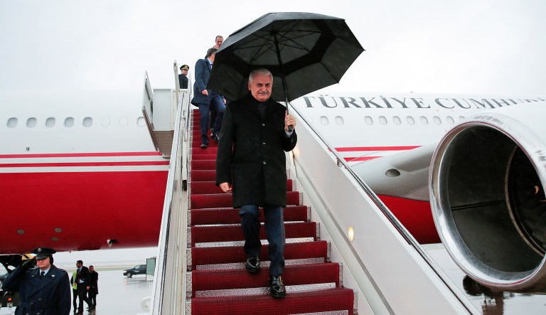 Turkey's Prime Minister Binali Yildirim arrives in Washington, late Tuesday, Nov. 7, 2017. Yildirim is in the United States to meet U.S. Vice President Mike Pence for talks aimed at mending frayed ties between the two NATO allies, including over Turkish demands for the extradition U.S.-based cleric Fethullah Gulen, who is blamed for last year's failed coup, and Washington's backing of Syrian Kurdish militia, whom Turkey considers to be terrorists. (Pool via AP)