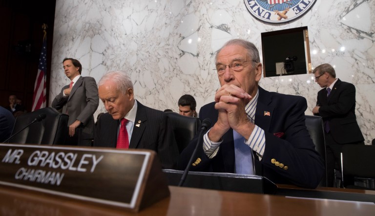 Senate Judiciary Committee Chairman Sen. Chuck Grassley, R-Iowa, joined at left by Sen. Orrin Hatch, R-Utah, leads a hearing on Capitol Hill in Washington. (AP Photo/J. Scott Applewhite)