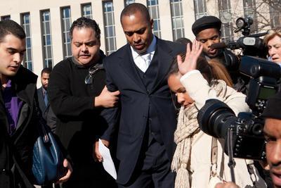 Councilman Harry Thomas Jr leaves court after pleading guilty to two federal crimes, Friday, Dec 6, 2012