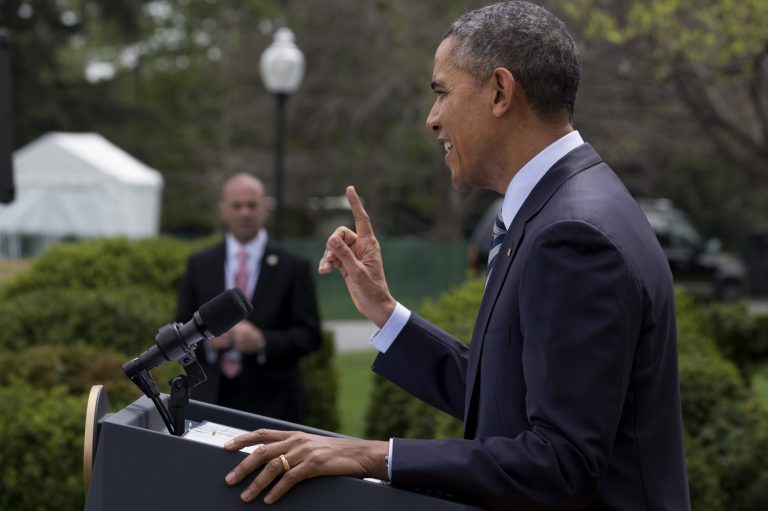 President Barack Obama speaks in the Rose Garden of the White House in Washington, Friday, April 18, 2014, where he presented the Commander-in-Chief's Trophy to the United States Naval Academy football team. The Obama administration is extending indefinitely the amount of time federal agencies have to review the Keystone XL pipeline, the State Department said Friday, likely punting the decision over the controversial oil pipeline past the midterm elections.  (AP Photo/Jacquelyn Martin)