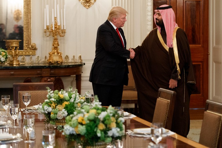 President Donald Trump shakes hands with Saudi Defense Minister and Deputy Crown Prince Mohammed bin Salman, Tuesday, March 14, 2017, in the State Dining Room of the White House in Washington. (AP Photo/Evan Vucci)
