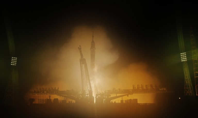 The Soyuz-FG rocket booster with Soyuz TMA-12M space ship carrying a new crew to the International Space Station (ISS) blasts off at the Russian leased Baikonur cosmodrome, Kazakhstan, Wednesday, March 26, 2014. The Russian rocket carries U.S. astronaut Steven Swanson, Russian cosmonauts Alexander Skvortsov and Oleg Artemyev. (AP Photo/Dmitry Lovetsky)