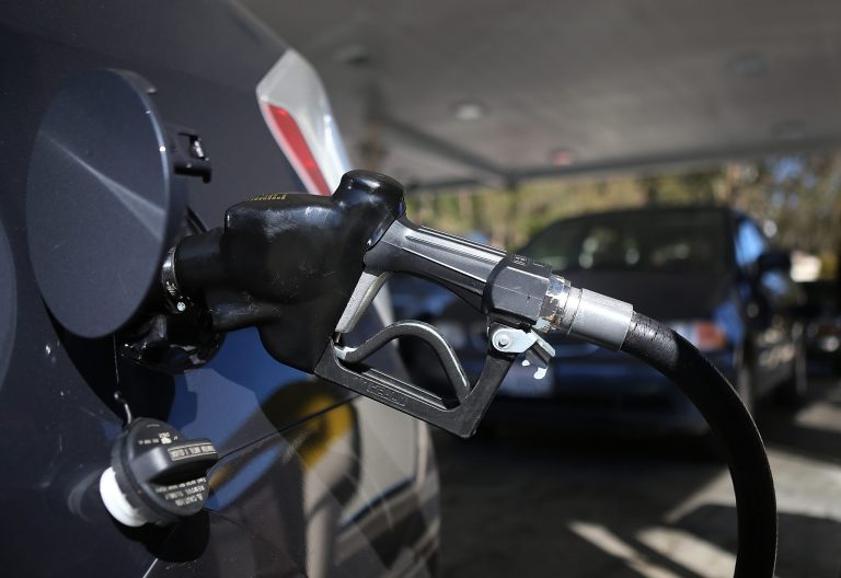 SAN FRANCISCO, CA - MARCH 01:  A gas pump nozzle sits in a car at a Chevron gas station on March 1, 2013 in San Francisco, California.  The California Board of Equalization voted on Thursday to implement a statewide excise tax on gasoline starting July 1 that will increase the tax by 3.5 cents to 39.5 cents per gallon.  (Photo by Justin Sullivan/Getty Images)